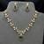 emerald green kundan necklace set with gold teardrop pendant