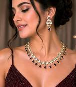 ruby red kundan necklace set with teardrop design