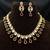 ruby red kundan necklace set with teardrop design