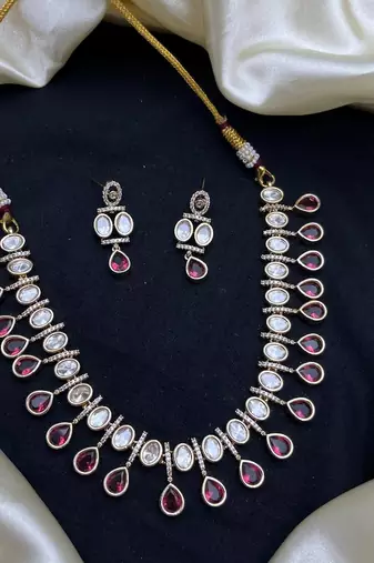 ruby red kundan necklace set with teardrop design