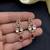 ruby red kundan necklace set with teardrop design