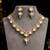 gold heart-shaped kundan necklace set with earrings