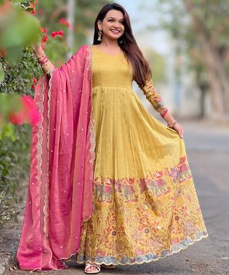 Yellow luxrious elegant position print embroidered gown paired with a contrast dupatta 1