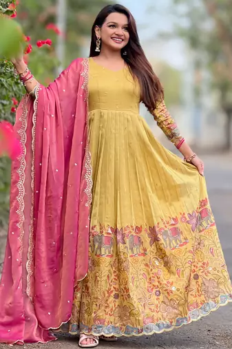 Yellow luxrious elegant position print embroidered gown paired with a contrast dupatta