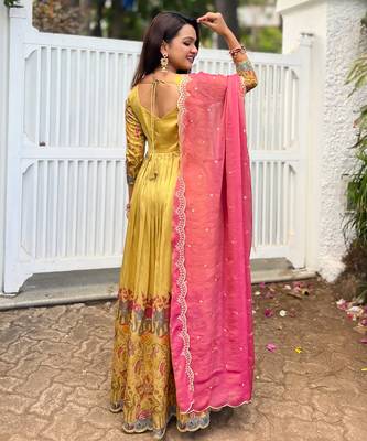 Yellow luxrious elegant position print embroidered gown paired with a contrast dupatta 2