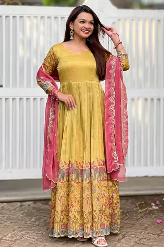 Yellow luxrious elegant position print embroidered gown paired with a contrast dupatta