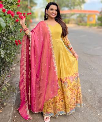 Yellow luxrious elegant position print embroidered gown paired with a contrast dupatta 4