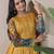 Mustard kalamkari print flared maxi gown with full sleeves for women