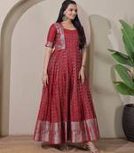 Pink zari weaving ethnic fit and flare weaving gown for women