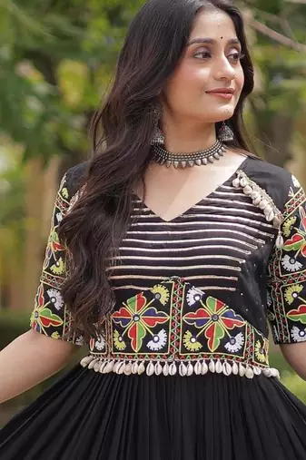 Black rayon kutchi gamthi thread embroidered & mirror work navratri gown