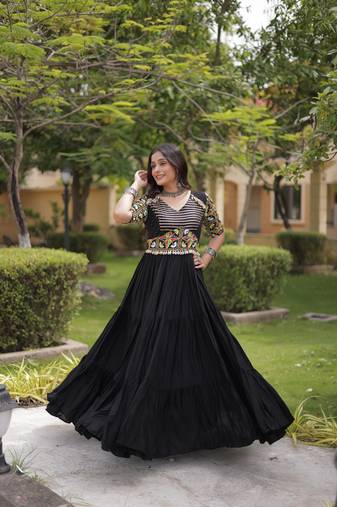 Black rayon kutchi gamthi thread embroidered & mirror work navratri gown