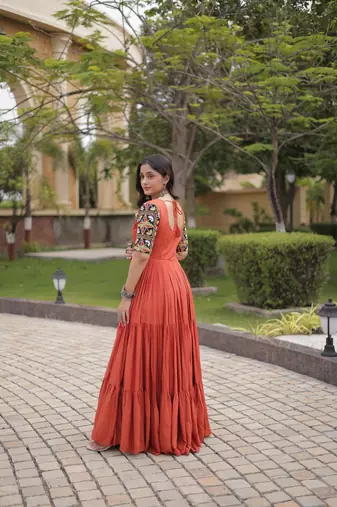 Rust rayon kutchi gamthi thread embroidered & mirror work navratri gown