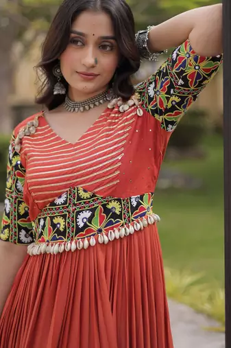Rust rayon kutchi gamthi thread embroidered & mirror work navratri gown