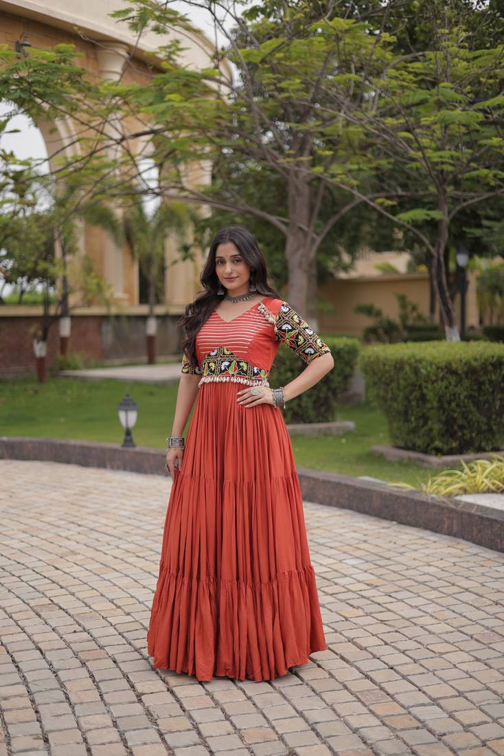 Rust rayon kutchi gamthi thread embroidered & mirror work navratri gown