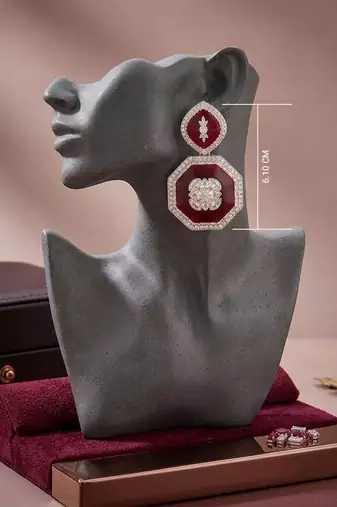 Red color kundan earrings featuring stylish modern jewelry collection for girls