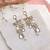 Gold color long kashmiri earrings with beautiful handmade ethnic fashion design
