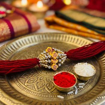 12 pieces combo multi color om design religious thread rakhis with auspicious spiritual handmade design 1
