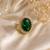 Green color kundan ring featuring premium festive designer appeal