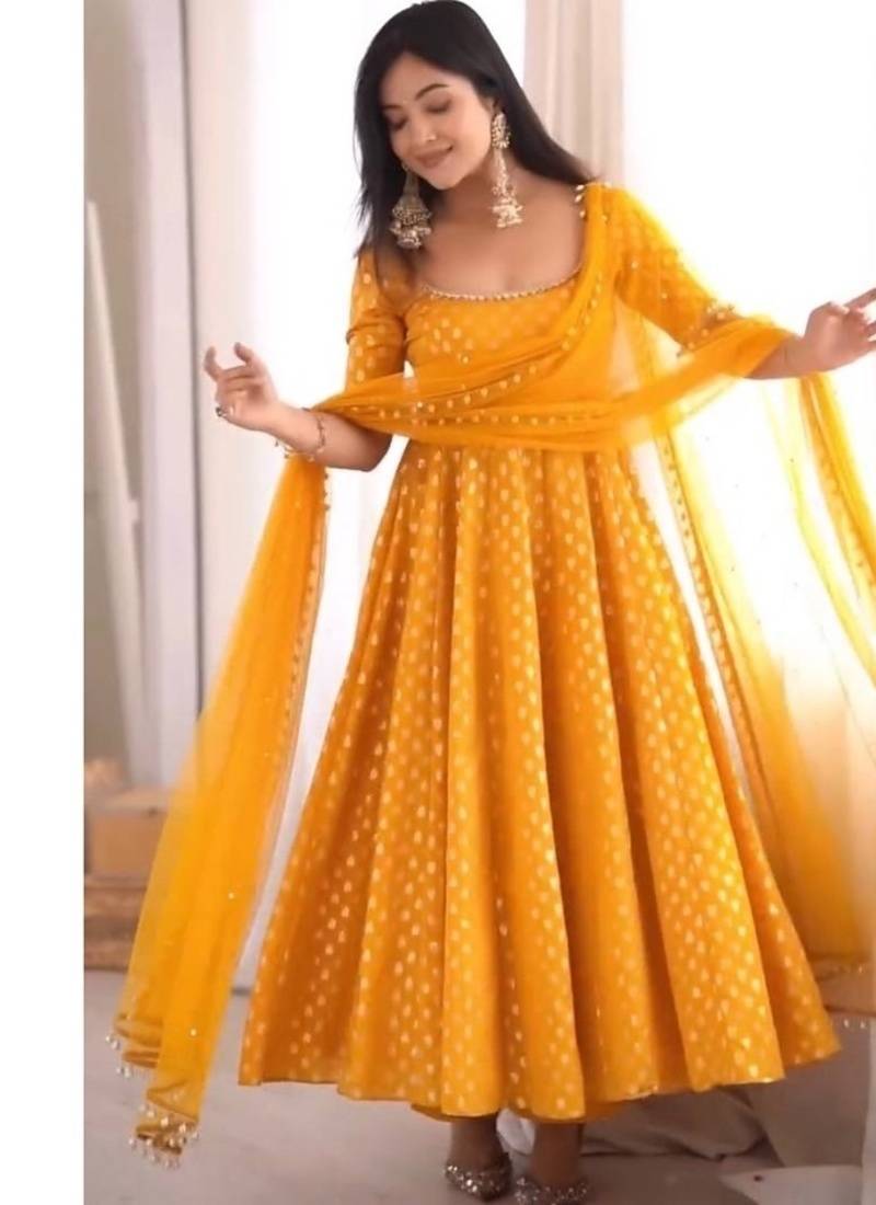 Yellow jeqauaed chanderi silk full stitched anarkali suit