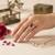 Red color kundan ring featuring graceful handmade festive jewelry appeal