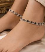 Rani & black color oxidised anklet with traditional floral pattern and elegant ethnic appeal