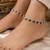 Rani & black color oxidised anklet with traditional floral pattern and elegant ethnic appeal