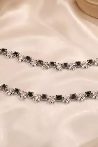 Rani & black color oxidised anklet with traditional floral pattern and elegant ethnic appeal