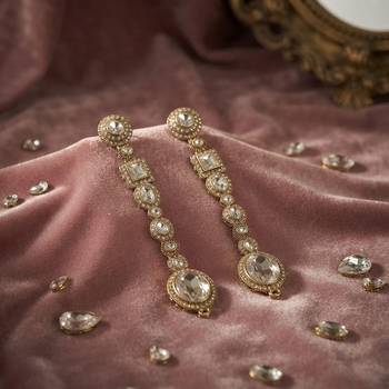White color kundan earrings with elegant traditional designer jewelry style 2