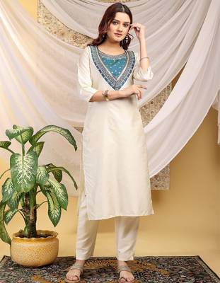 Cream-skyblue color embroidered art silk kurti set full stitched. 1