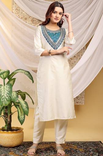 Cream-skyblue color embroidered art silk kurti set full stitched.
