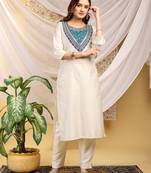 Cream-skyblue color embroidered art silk kurti set full stitched.