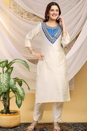Cream-skyblue color embroidered art silk kurti set full stitched.