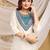 Cream-skyblue color embroidered art silk kurti set full stitched.