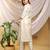 Cream-purple color embroidered art silk kurti set 