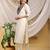 Cream-purple color embroidered art silk kurti set 