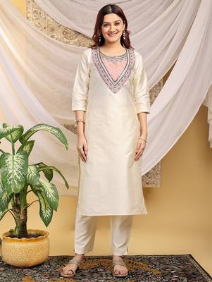 Cream-peach color embroidered art silk kurti set  1