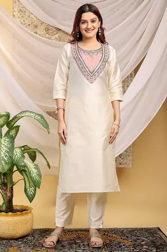 Cream-peach color embroidered art silk kurti set 
