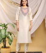 Cream-peach color embroidered art silk kurti set 
