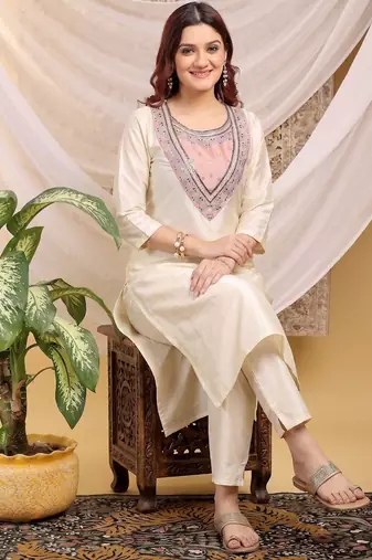 Cream-peach color embroidered art silk kurti set 