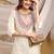 Cream-peach color embroidered art silk kurti set 