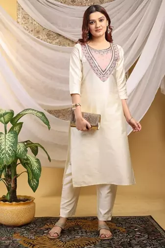 Cream-peach color embroidered art silk kurti set 