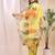 Lemon color embroidered art silk party wear kurti set 