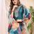 Green color embroidered art silk party wear kurti set 