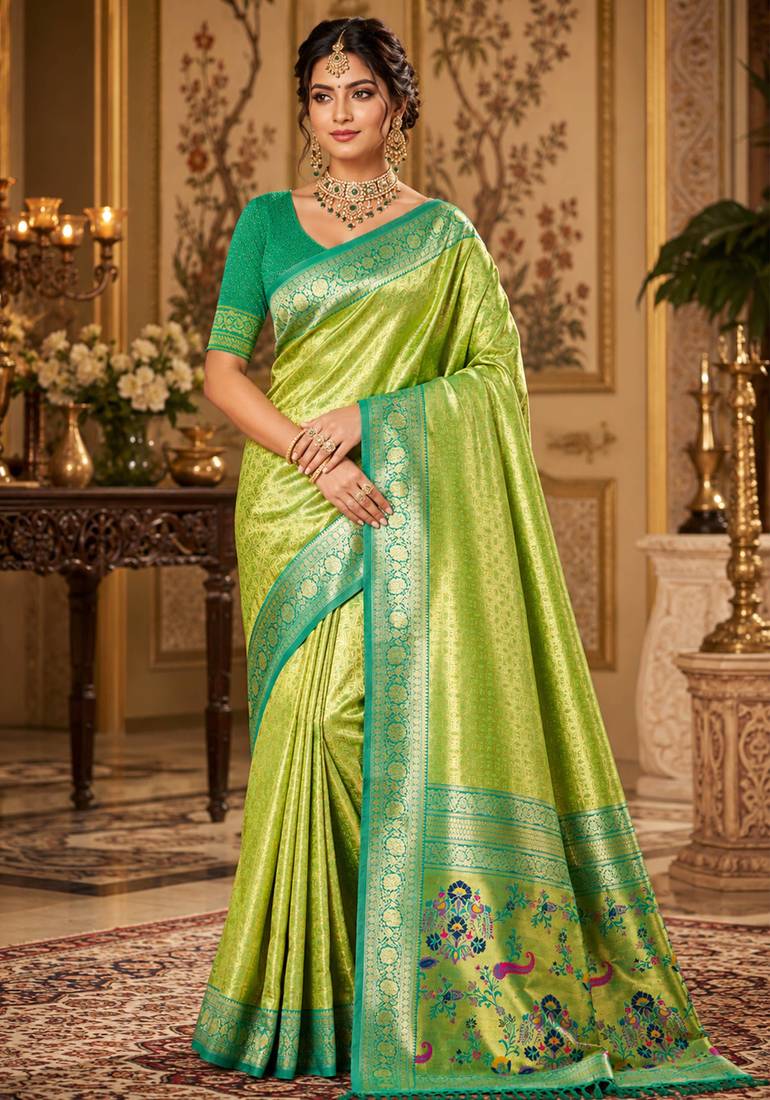 parrot green kanjivaram silk blend woven work traditional saree