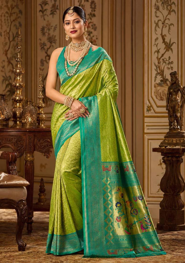 parrot green kanjivaram silk blend woven work traditional saree