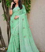 pista green linen woven work traditional saree