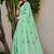 pista green linen woven work traditional saree
