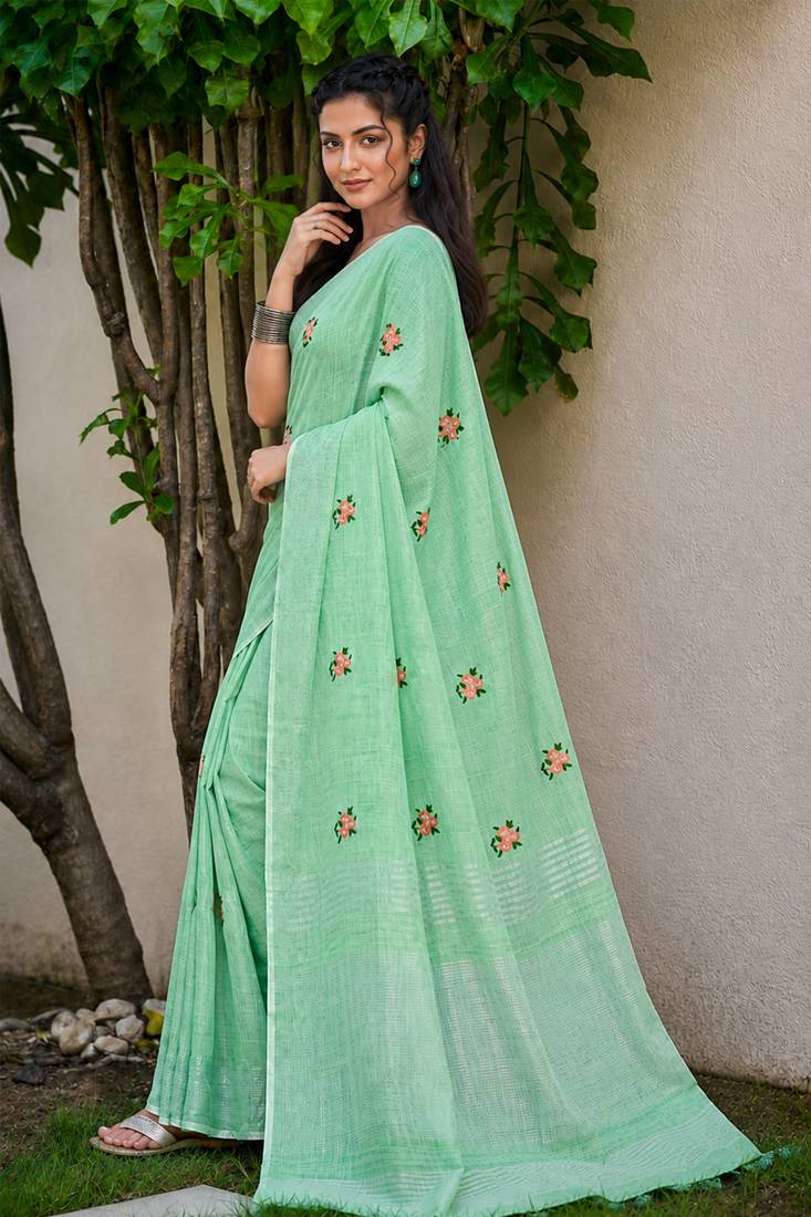 pista green linen woven work traditional saree
