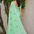 pista green linen woven work traditional saree