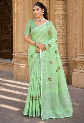 pista green linen woven work traditional saree 1